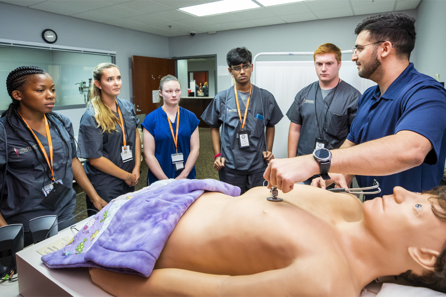 Students at a SSTRIDE Summer Institute learn about patient encounters at the FSU College of Medicine Clinical Learning Center. (Colin Hackley/FSU College of Medicine)