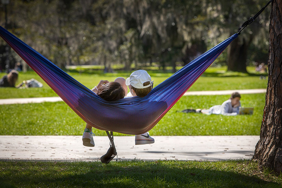 FSU students enjoy a lazy March day on Mina Jo Powell Green. (FSU Photography Services)