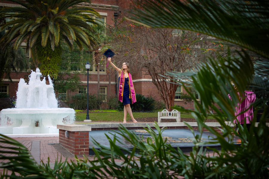 Florida State University graduates taking photos in the Westcott Plaza. (FSU Photography Services)