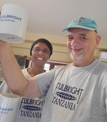 Frank Gunderson and wife, Leyla Meghji, sporting Fulbright merchandise in Dar es Salaam.