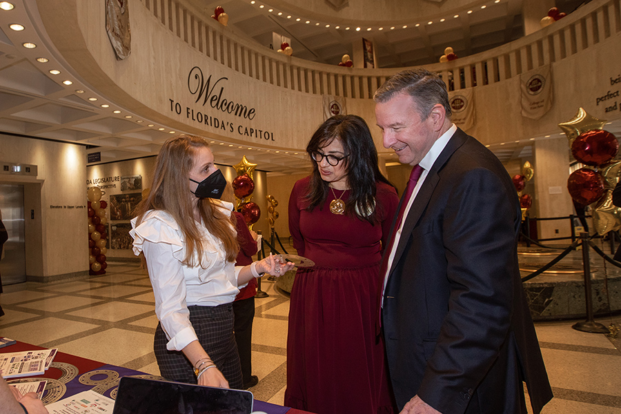 President Richard McCullough and FSU First Lady Jai Vartikar visit the National MagLab booth during FSU Day at the Capitol Feb. 9.