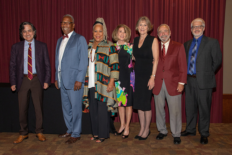 Photo caption: 2021 and 2020 Torch Award recipients were recognized at the Torch Awards ceremony March 3. (From L to R) FSU Provost Jim Clark, Fred Flowers, Doby Flowers, Virginia Wetherell Scott, Paula Peters Smith, Greg Beaumont and Faculty Senate President Eric Chicken. Not pictured is Warrick Dunn who was unable to attend the ceremony. (FSU Photography Services)