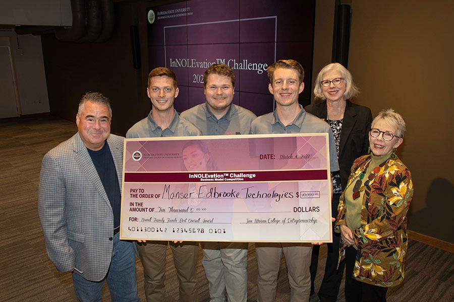 Pictured left to right: Vince Nowell, president of Alco Fence Company; FAMU-FSU College of Engineering students Cody Cribbs, Patrick Manser and Charlie Edbrooke; Wendy Plant, director of Student Engagement; and Susan Fiorito, dean of Jim Moran College of Entrepreneurship.