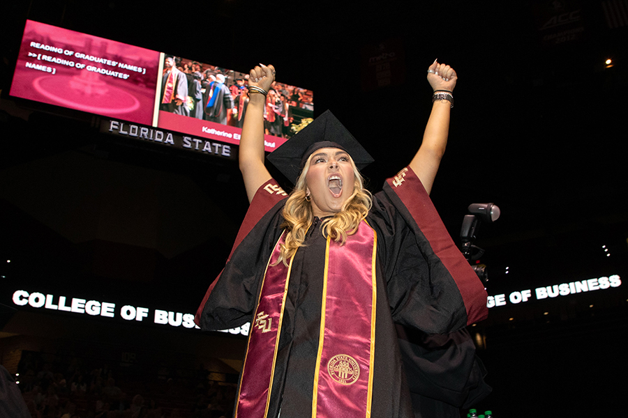 A Florida State University graduate celebrates spring commencement Friday, April 29, 2022. (FSU Photography Services)