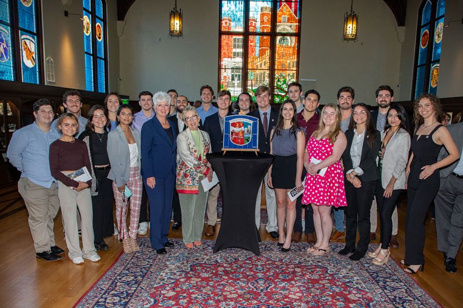 Jan Moran and Susan Fiorito (middle), along with students from the Jim Moran College of Entrepreneurship, celebrate the dedication of the newest stained-glass window in Dodd Hall’s Heritage Museum April 13, 2022. (FSU Photography Services)
