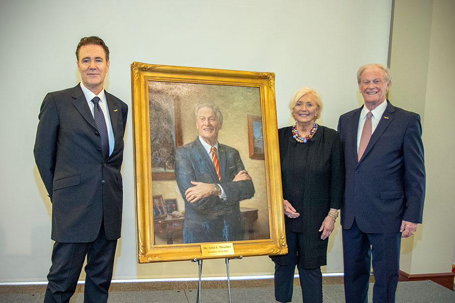 President Emeritus John Thrasher and former FSU First Lady Jean Thrasher with portrait artist Paul Newton at the unveiling ceremony April 25, 2022. (FSU Photography Services)
