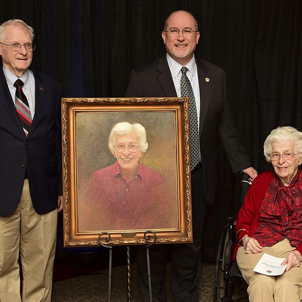 College of Business Dean Michael Hartline, center, joins Persis and Charles Rockwood at a 2019 event to celebrate the naming of the Persis E. Rockwood Undergraduate Programs Suite in Legacy Hall, the college’s future home. Persis Rockwood was a trailblazing FSU professor who died in May 2021 at age 97.