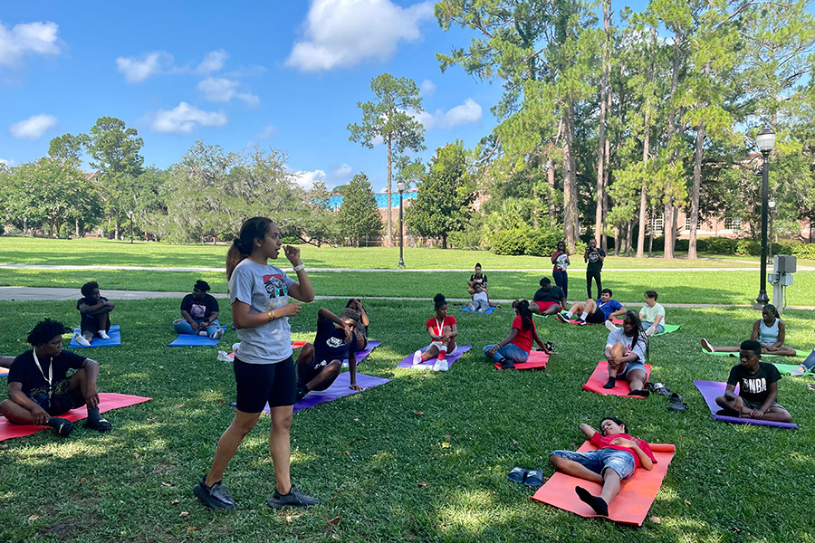 Instructor Sandra Alber explains mindfulness to middle-school students during the University Summer Experience program at Florida State University's main campus on Monday.