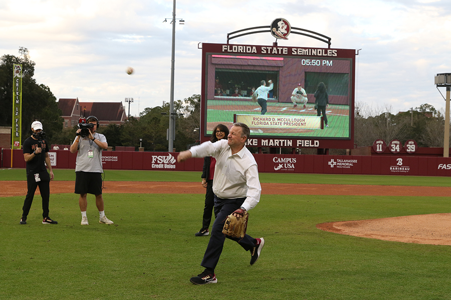 FSU President Richard McCullough throws out the first pitch during a game last season at Dick Howser Stadium on Feb. 18, 2022. (FSU Photography Services)
