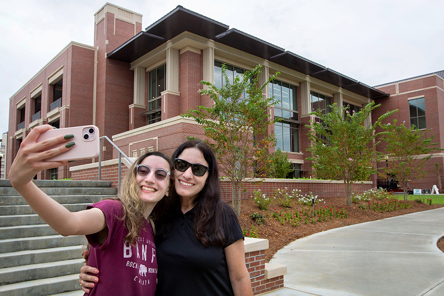 Aliah Bangash takes a selfie with her mother Odalys outside the new Student Union. Aliah is an incoming freshman from West Palm Beach.