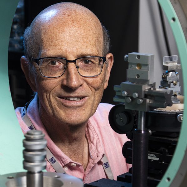 Theo Siegrist, a professor of chemical and biomedical engineering at the FAMU-FSU College of Engineering, looks through the Euler cradle of an X-ray diffractometer. Siegrist will use this machine for structural analysis to examine the superconducting properties of a compound made of niobium, palladium, and either sulfur or selenium. This research is funded by the National Science Foundation. (Mark Wallheiser/FAMU-FSU College of Engineering)