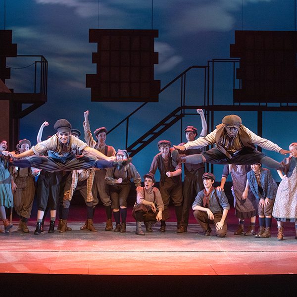 Students perform in the School of Theatre production of “Newsies” (2021).