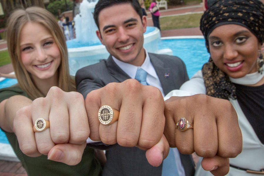FSU graduating students participate in the traditional Ring Ceremony, in which the soon-to-be alumni dip their class rings in the Westcott fountain. (FSU Photography Services/Bruce Palmer)