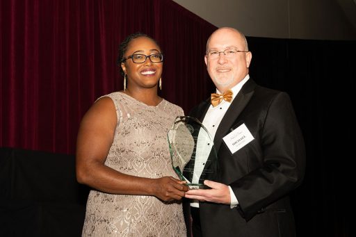 Dean Michael Hartline presented Christina Lynch with the 2022 Business School Recent Alumni Achievement Award at a ceremony in October.  January 13, 2022, at the FSU Student Union.