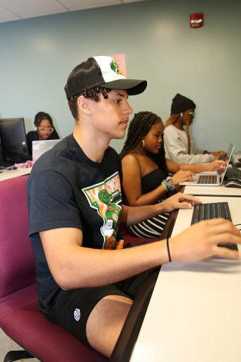 Larry Harper gets some work done at the CARE Tutoring & Computer Lab.