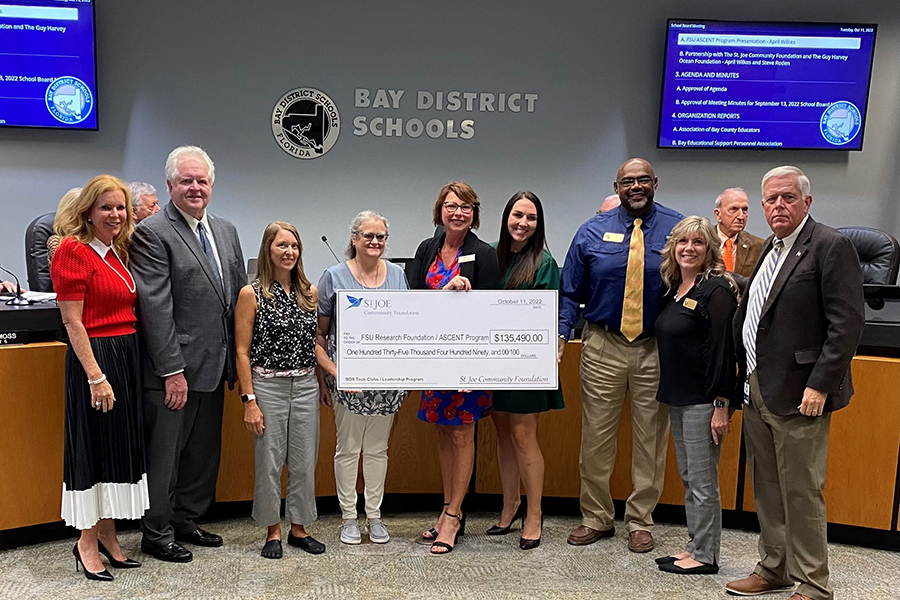 FSU PC held a check presentation at 1 p.m. Tuesday, Oct. 11, at the Bay District Schools Board Meeting (1311 Balboa Ave, Panama City, FL) with members of the St. Joe Community Foundation and ASCENT Program, including Larry Dennis, program director, and Suzanne Remedies, program manager.