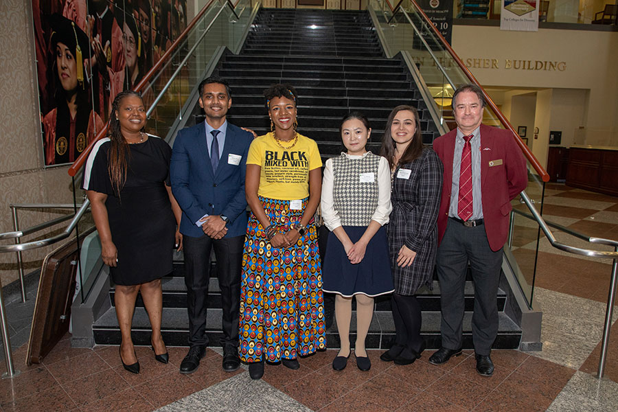 Adrienne Stephenson, assistant dean of The Graduate School and director of the Office of Graduate Fellowships and Awards; Akshay Anand, people's choice winner; Dionne Wilson, first-place winner; Sen Wang, third-place winner; Rachel Flemming, second-place winner; and Mark Riley, dean of The Graduate School. (FSU Photography Services/Bill Lax)