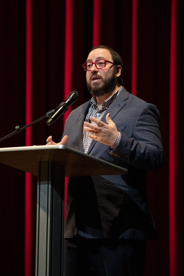 Patrick Rizzotti, head curator from the United States Institute for Theatre Technology speaks at the FSU School of Theatre Prague Quadrennial of Performance Design and Space unveiling on Jan. 12, 2023 in the Richard G. Fallon Theatre. (FSU Photography Services)