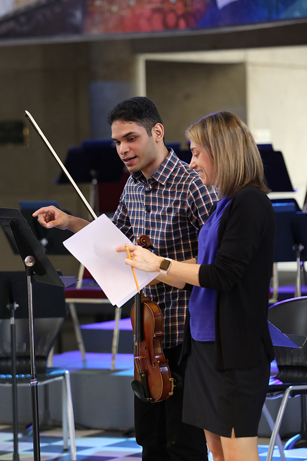 FSU Professor of Violin Dr. Shannon Thomas accompanied the USO as a featured soloist, and is seen here leading a masterclass for students of the Universidad Nacional Pedro Henríquez Ureña.