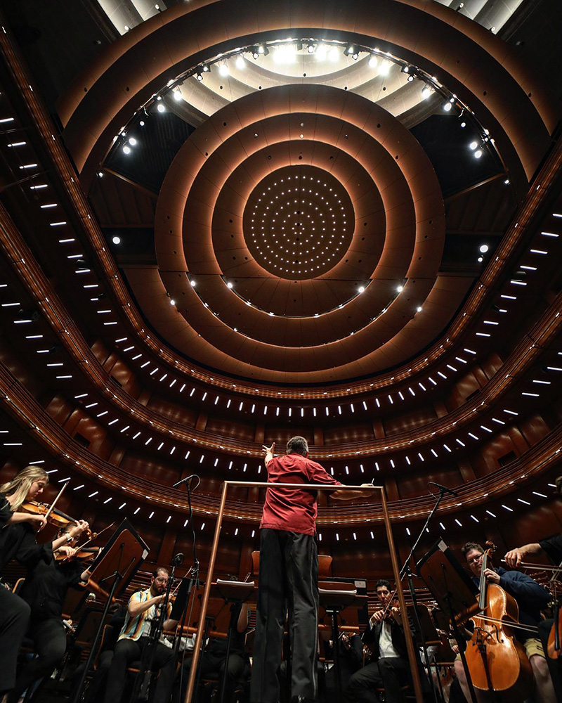 Dr. Alexander Jiménez leads the Florida State University Symphony Orchestra in the stunning Steinmetz Hall at the Dr. Phillips Center for the Performing Arts in Orlando, Florida on March 7, 2023.