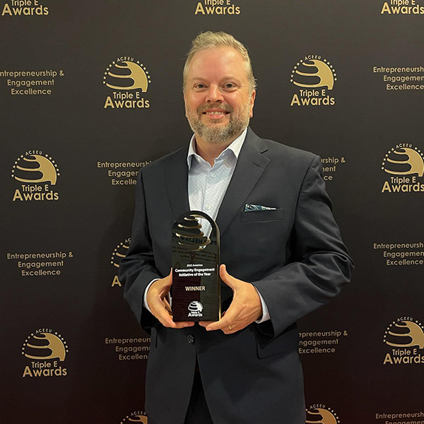 Damon Andrew, dean of the FSU College of Education, accepted the first place award for Community Engagement Initiative of the Year during the Triple E Awards Monday, June 26, in Barcelona, Spain. (FSU College of Education)