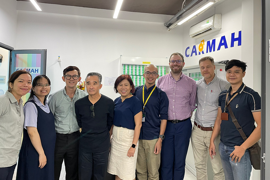 Researchers from the C-PSHE at FSU pose for a picture with CARMAH researchers in Vietnam. (An Bao)