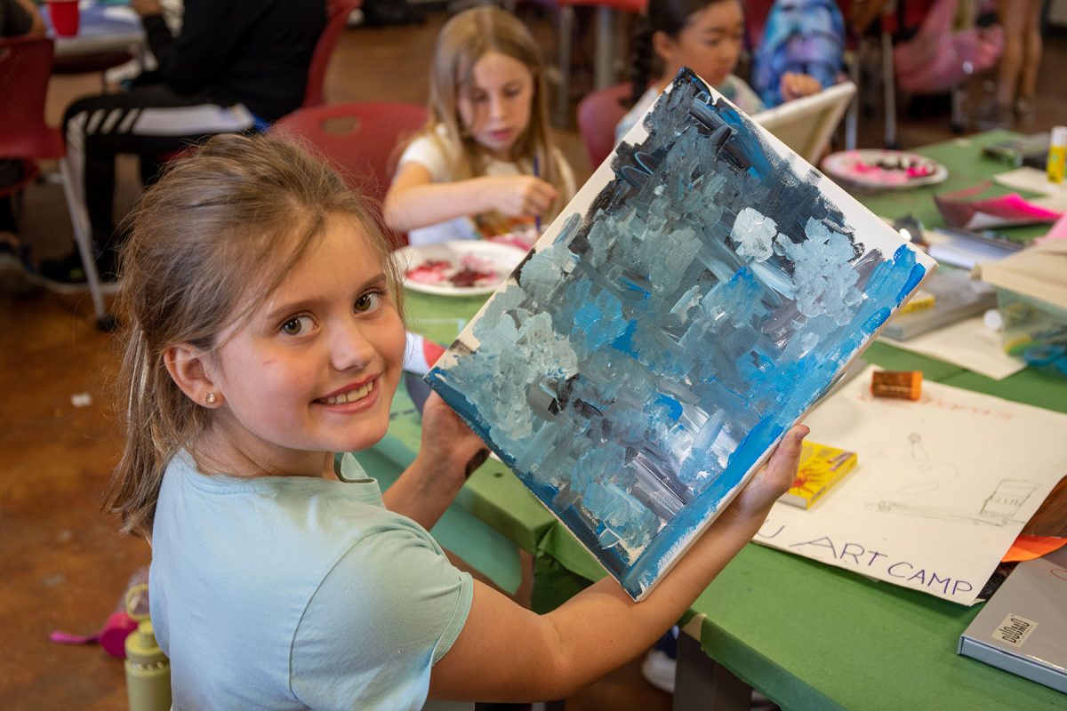 Children create works of art under the guidance of graduate students during the department of Art Education's Summer Art Camp.
