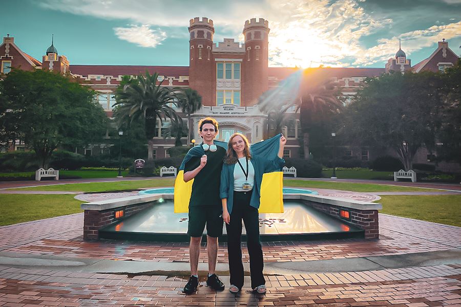 Lysenko and Mikhnovska pose for a photo in front of FSU’s iconic Westcott building. (Roman Lysenko and Yevheniia Mikhnovska)