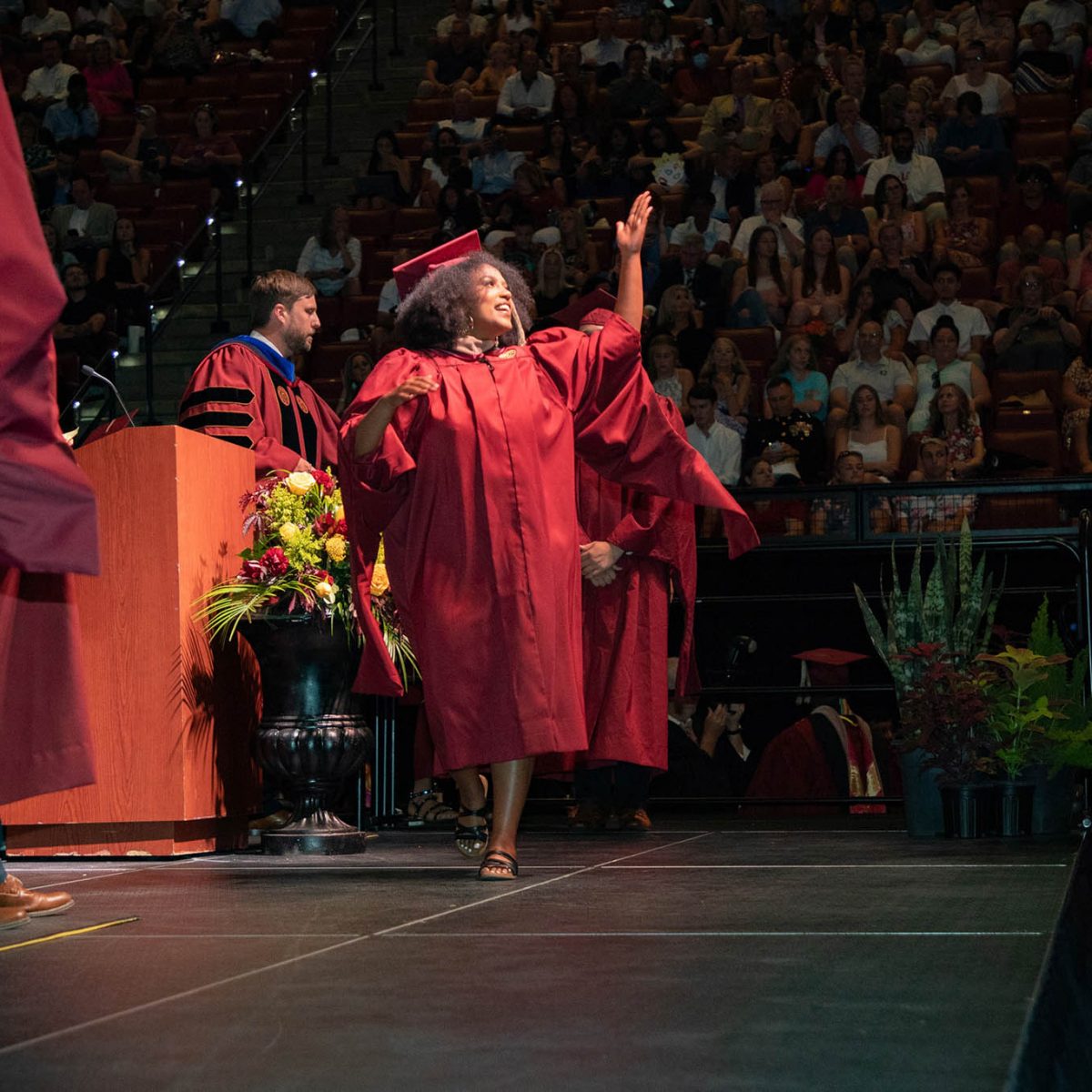 A Florida State University graduate celebrates during summer commencement Friday, Aug. 4, 2023, at the Donald L. Tucker Civic Center. (FSU Photography Services)
