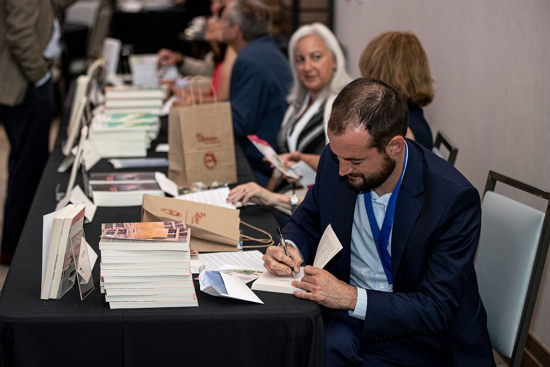 Florida Book Award winners signing books at the 2022 awards ceremony. (Steve Chase of Chase Photography)