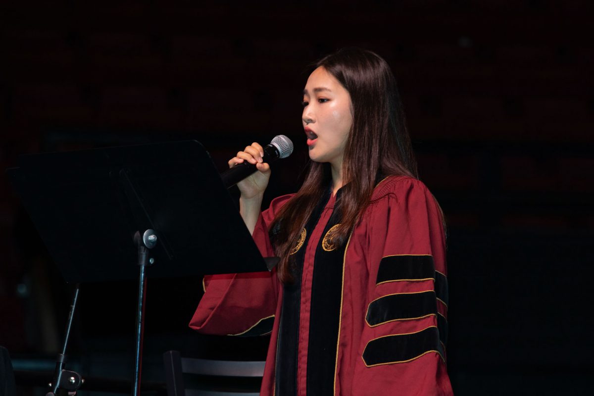 Doctoral student Ye Ji Lee sings the National Anthem at FSU's summer doctoral hooding ceremony Friday, Aug. 4, 2023. (FSU Photography)