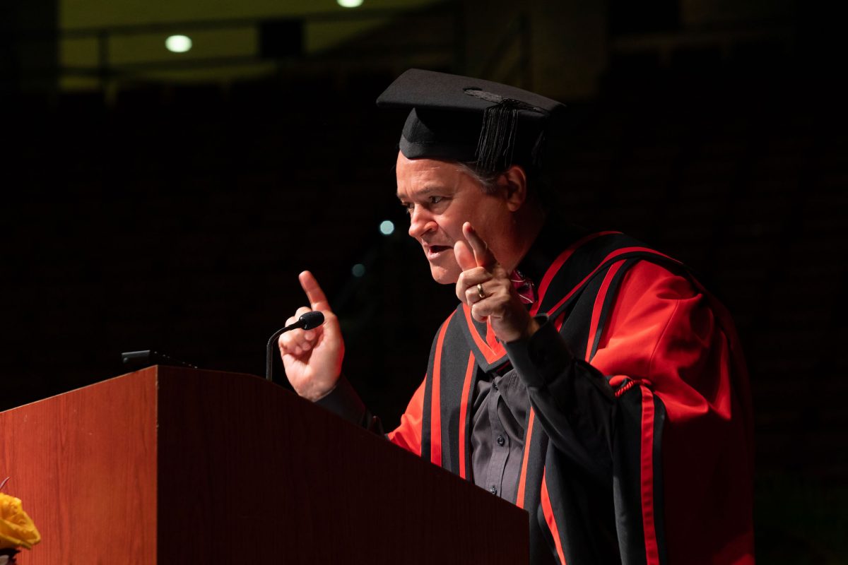 Florida State University Dean of the Graduate School Mark Riley welcomes graduates and their guests to the university’s summer doctoral hooding ceremony Friday, Aug. 4, 2023, at the Donald L. Tucker Civic Center. (FSU Photography)