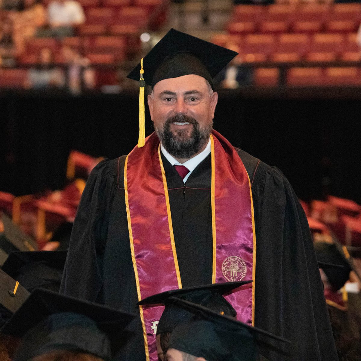 Travis Wilson, an assistant coach for Florida State softball with nine ACC Championships, five Women's College World Series appearances and a 2018 National Championship, earned his bachelor's degree in interdisciplinary social sciences. (FSU Photography Services)