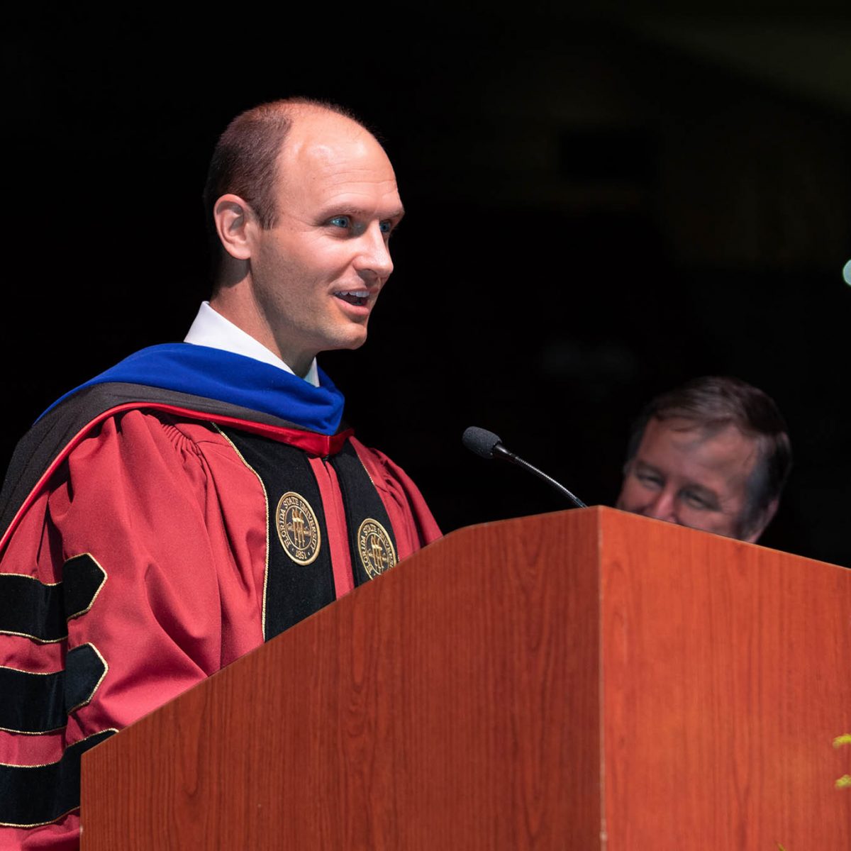 Joe O’Shea, associate provost and dean of Undergraduate Studies welcomes graduates at summer commencement Friday, Aug. 4, 2023, at the Donald L. Tucker Civic Center. (FSU Photography Services)