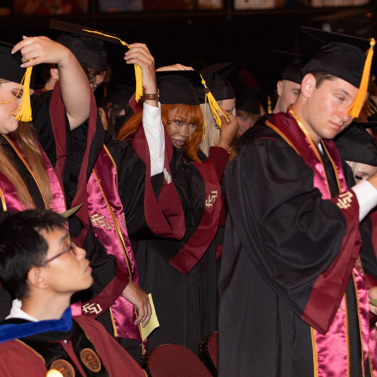 Florida State University graduates celebrate during summer commencement Friday, Aug. 4, 2023, at the Donald L. Tucker Civic Center. (FSU Photography Services)