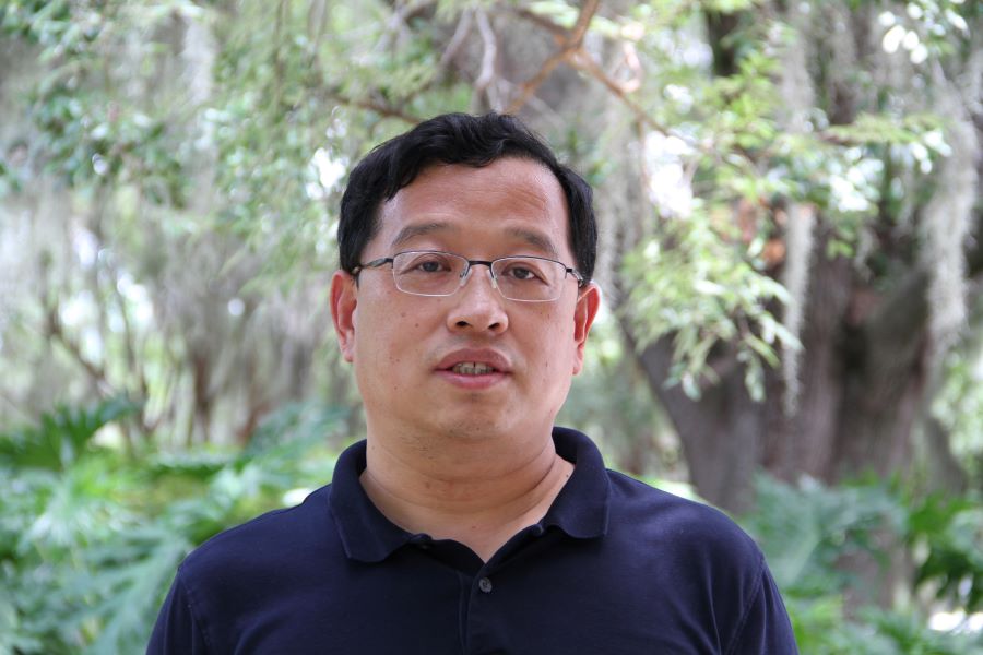 Zhenghao Zhang, a professor in the Department of Computer Science, part of the College of Arts and Sciences. (Photo by: Hannah Fulk/College of Arts and Sciences)