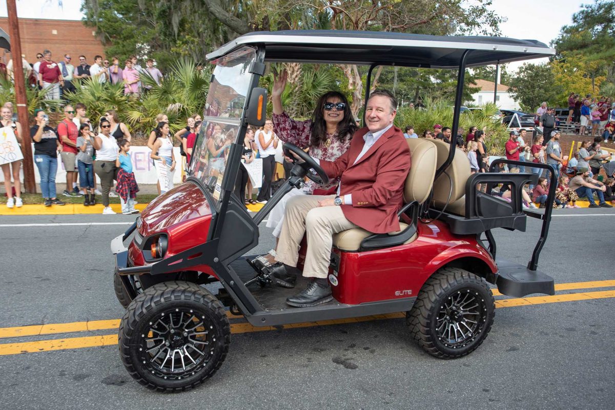 President Richard McCullough and First Lady Jai Vartikar in the FSU Homecoming Parade, Oct. 20, 2023. (FSU Photography Services)
