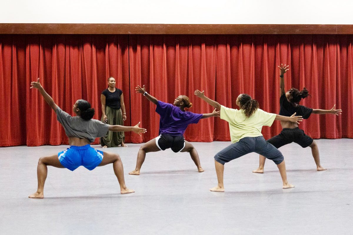 Students work with School of Dance alumni and former Urban Bush Women company member, Bennaldra Williams (BFA, 2005), on the restaging of Professor Jawole Willa Jo Zollar's "Give Your Hands to Struggle." (Meagan Helman)