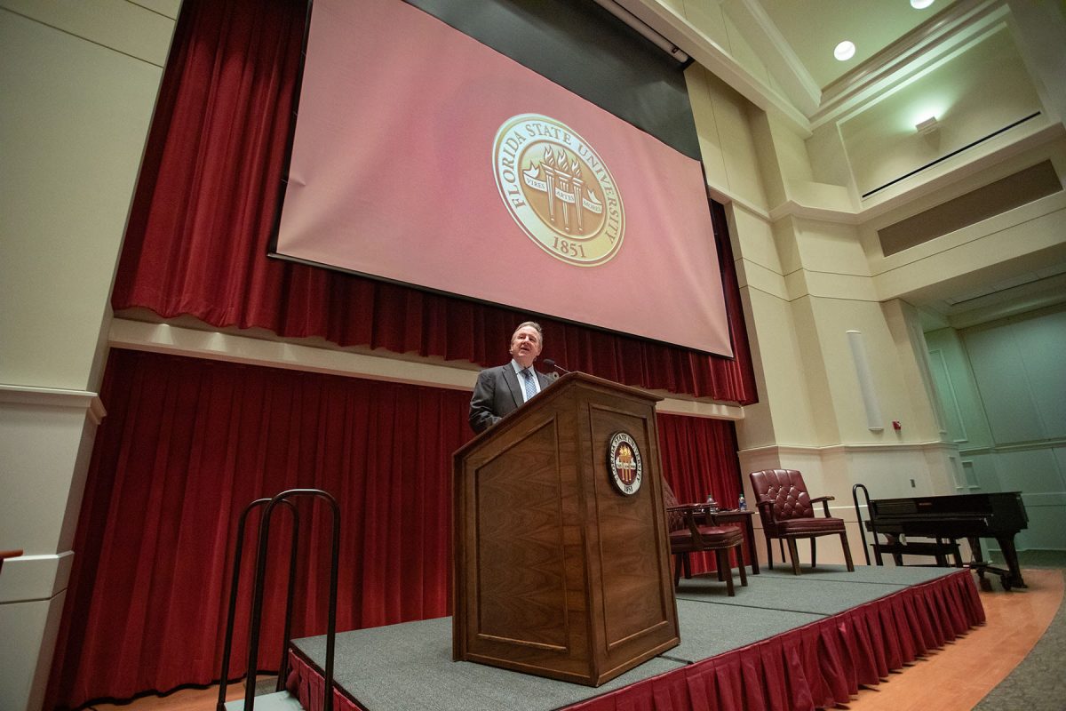 FSU President Richard McCullough introduced Dr. Q to the audience at the College of Medicine for a presidential symposium on Monday, Oct. 2. (FSU Photography Services)