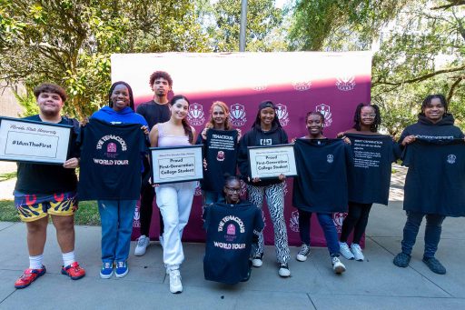 Alicie Raymond, second from left, a fourth-year clinical studies major and first-generation student, poses with others at the annual National First-Generation College Celebration hosted at FSU by the Center for Academic Retention and Enhancement. (Brittany Mobley, Undergraduate Studies)