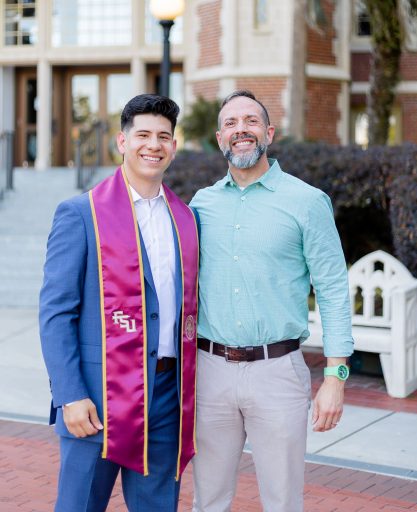 Daniel Zuniga, a Rhodes finalist, poses with Craig Filar, associate dean for Undergraduate Studies and director of the Office of National Fellowships, before Florida State University's commencement in May 2023.