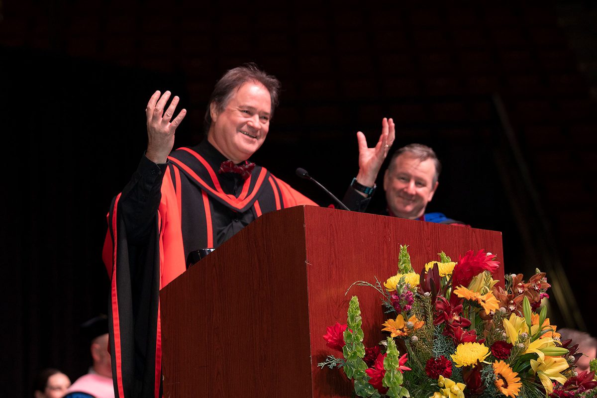 Florida State University Dean of the Graduate School Mark Riley welcomes graduates and their guests to the university’s fall doctoral hooding ceremony Friday, Dec. 15, 2023, at the Donald L. Tucker Civic Center. (FSU Photography Services)