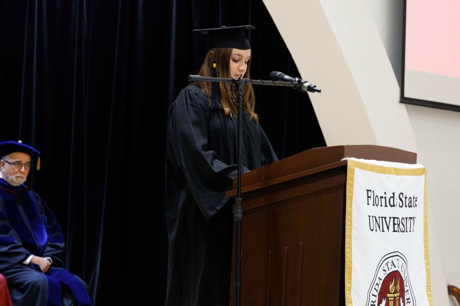 FSU-Panama Study Body President Clare Honoré addresses the FSU-Panama Class of 2023 during a commencement ceremony Tuesday, Dec. 5, at the City of Knowledge Convention Center in Panama City, Panama. (FSU-Panama, Pedro Ahues)