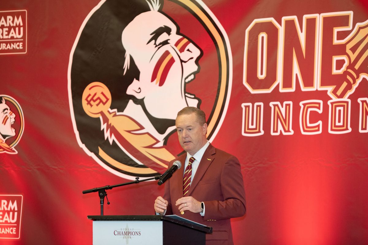 Florida State vice president and director of athletics Michael Alford speaks at the championship ceremony held at the Champions Club, Dec. 5, 2023. (FSU Photography)