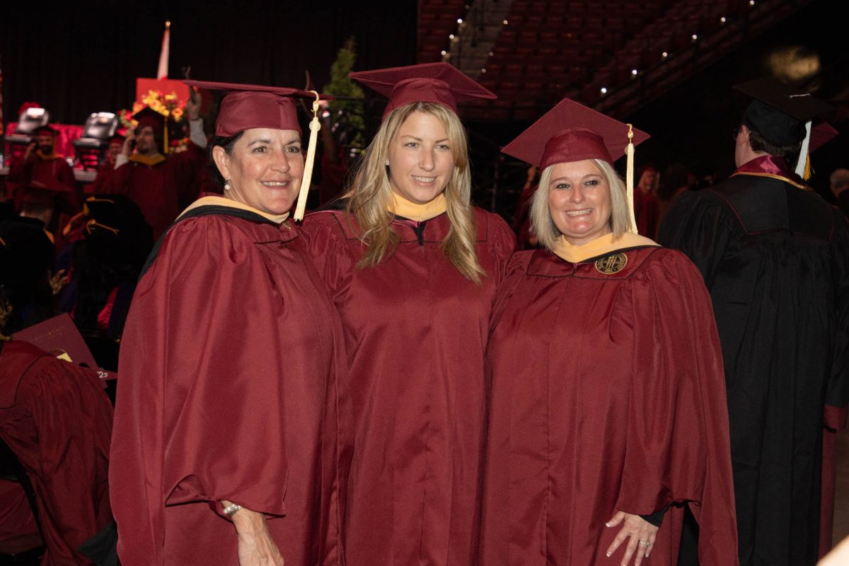 Florida State University graduates celebrate during fall commencement Friday, Dec. 15, 2023, at the Donald L. Tucker Civic Center. (FSU Photography Services)