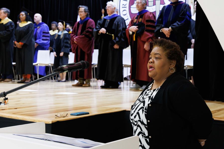 FSU-Panama staff member Valerie Myrie sings the national anthem of Panama during the FSU-Panama 2023 commencement Tuesday, Dec. 5, at the City of Knowledge Convention Center in Panama City, Panama. (FSU-Panama, Pedro Ahues)
