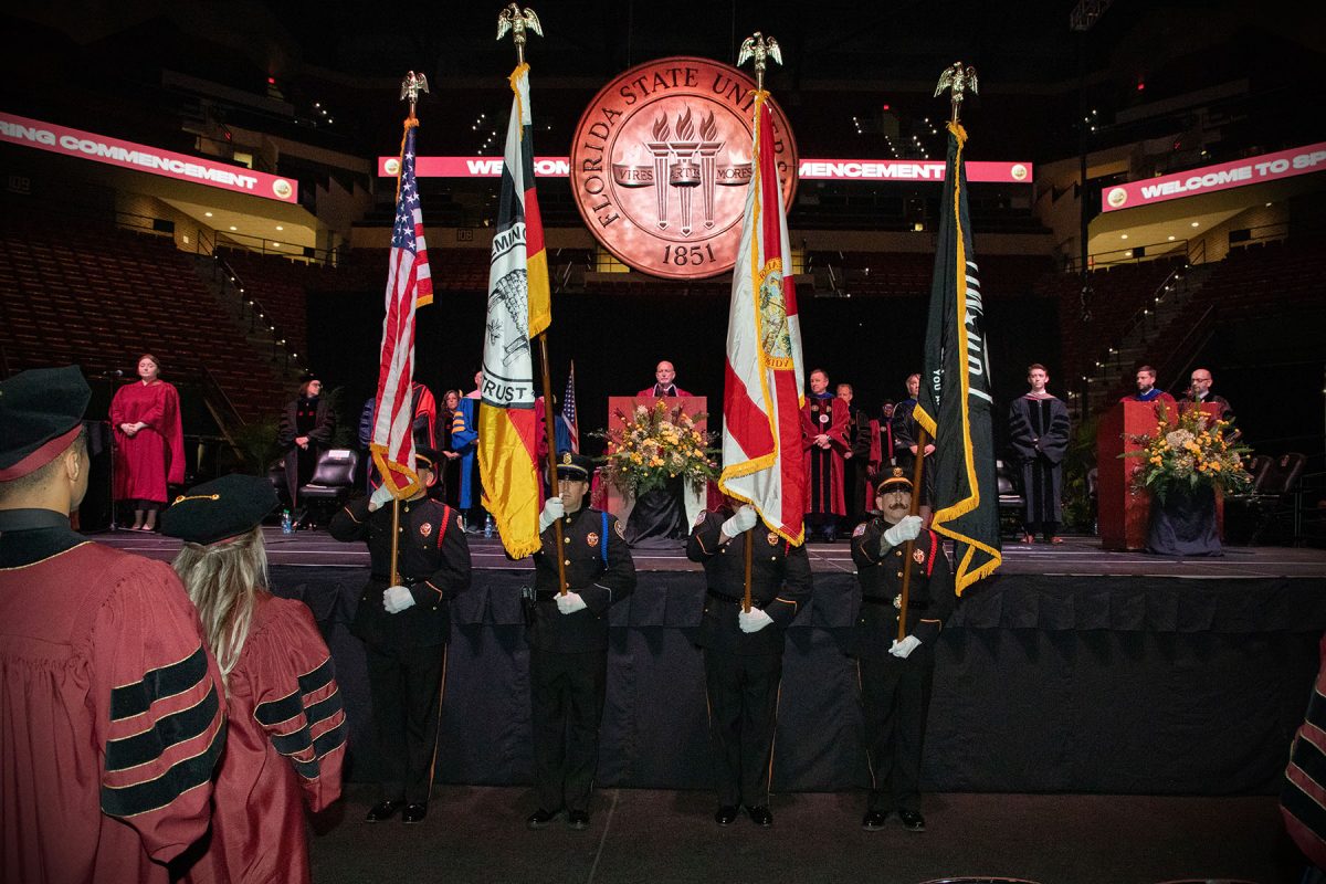 The Seminole Tribe of Florida Color Guard presents the colors at FSU's spring doctoral hooding ceremony Friday, May 3, 2024, at the Donald L. Tucker Civic Center. (FSU Photography)