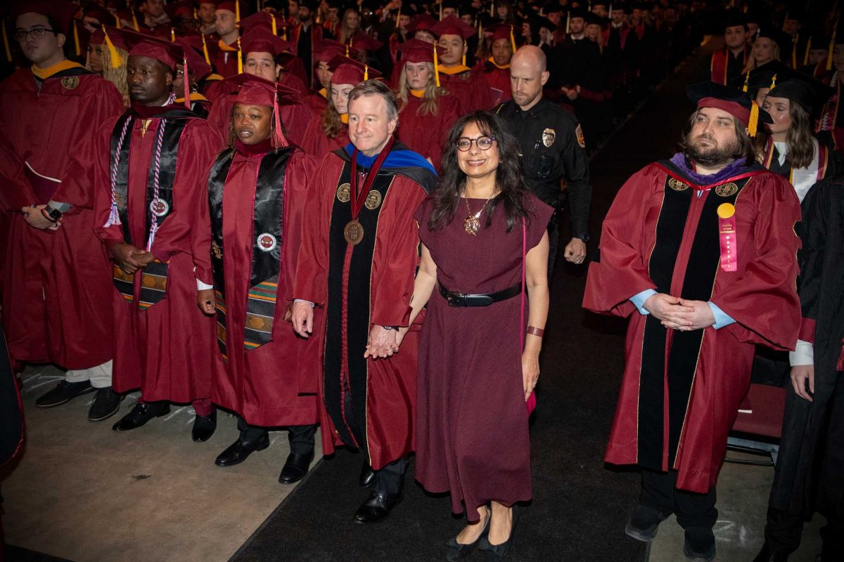 FSU President Richard McCullough and First Lady Dr. Jai Vartikar process into one of FSU's spring 2024 commencement ceremonies on Saturday, May 4, 2024, at the Donald L. Tucker Center. (FSU Photography)