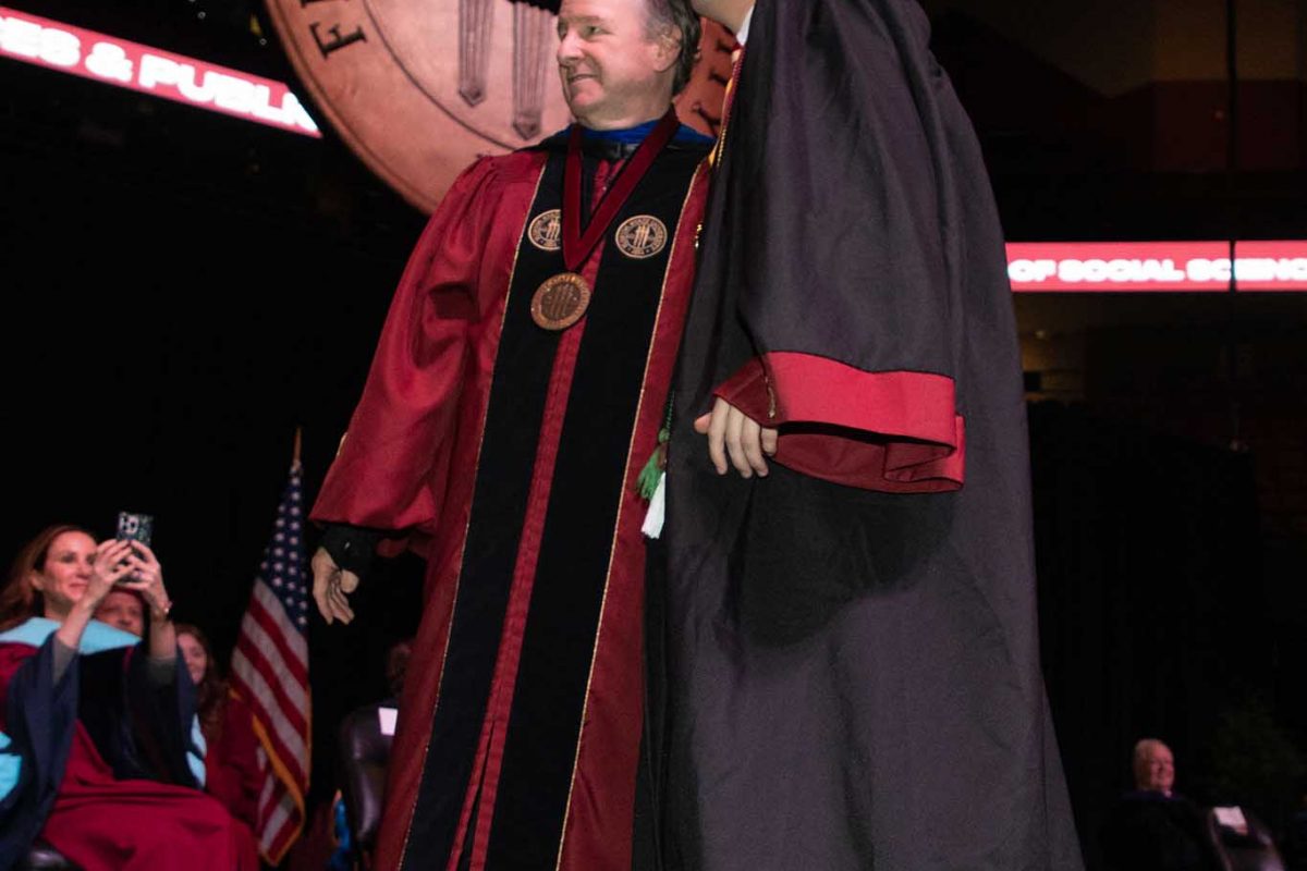FSU President Richard McCullough poses with Student Body President Jack Hitchcock as he graduates during one of FSU's spring 2024 commencement ceremonies Saturday, May 4, 2024, at the Donald L. Tucker Civic Center. (FSU Photography Services)