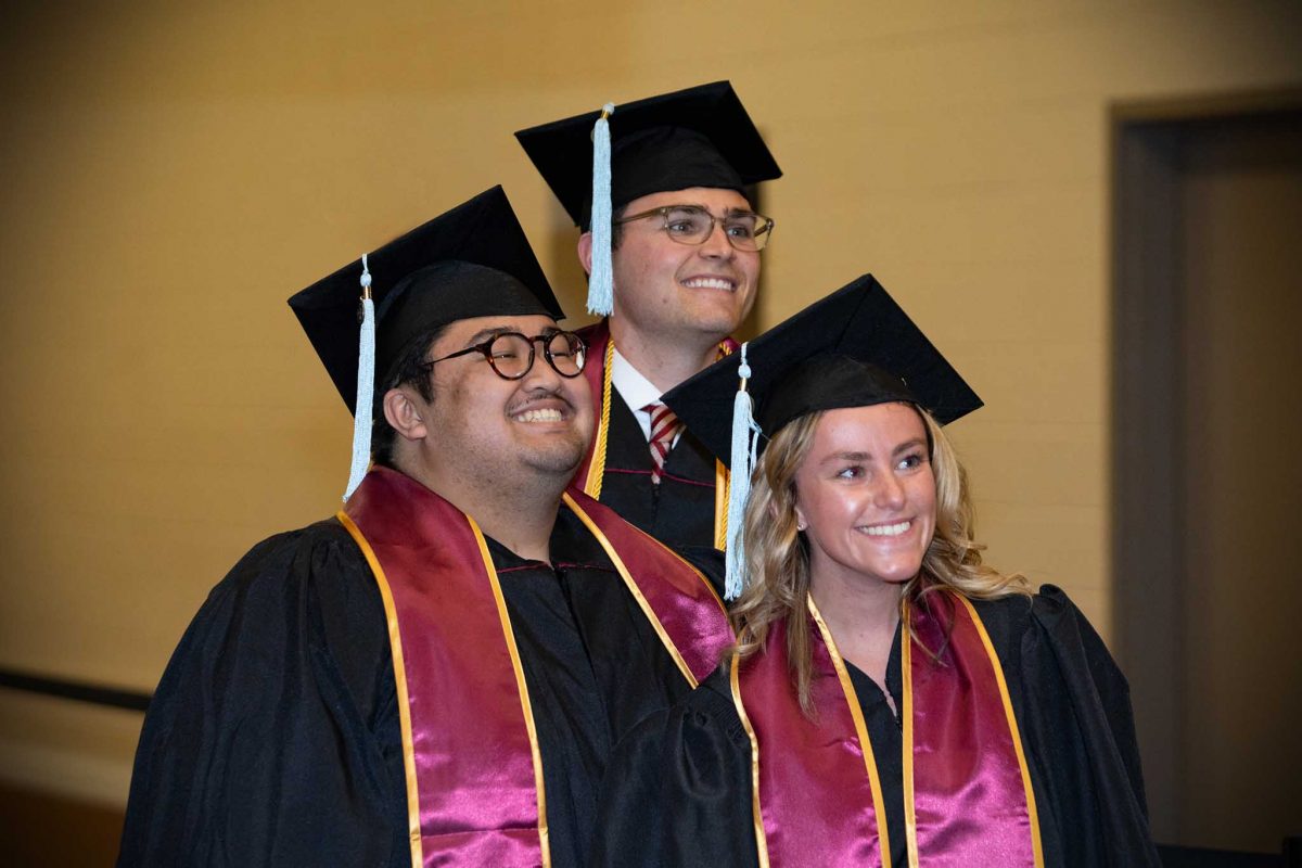 Graduates pose for a photo during one of FSU's spring 2024 commencement ceremonies Saturday, May 4, 2024, at the Donald L. Tucker Civic Center. (FSU Photography Services)
